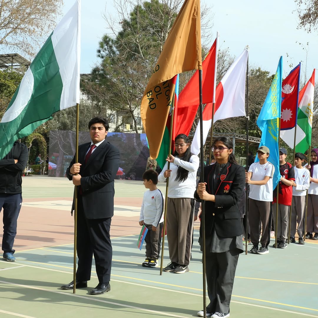 Flag bearers at the PSI Sports Meet 2025